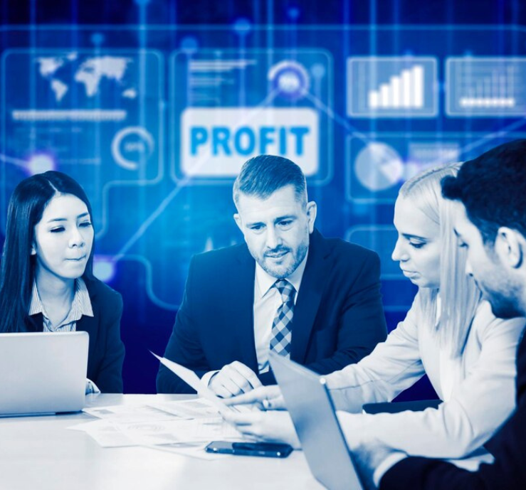 Corporate HR strategy meeting by Akrisha Management India Pvt. Ltd. – business professionals analyzing recruitment metrics, employee performance data, and workforce planning charts on a digital tablet